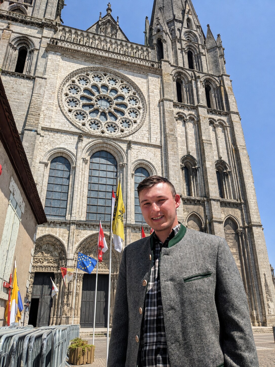 Alfonso Menanno outside a historic cathedral